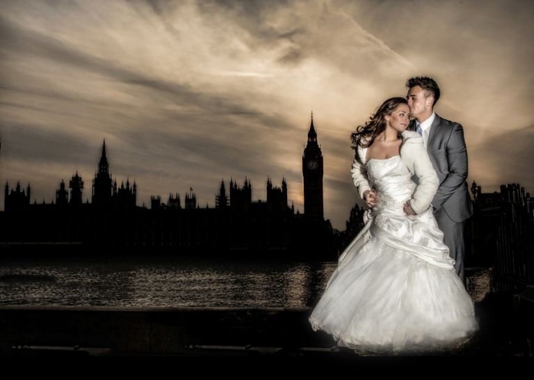 Bride and groom in front of the Houses of Parliament in central Lodnon